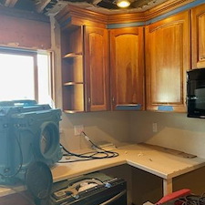 Insurance Repair & Refinishing kitchen Cabinets, New Countertops and Backsplash 9